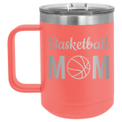 Laser etched coral 15 oz vacuum insulated coffee mug with 'Mom Basketball2' design