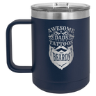 Laser etched navy 15 oz vacuum insulated coffee mug with 'Awesome Dads have Tattoos and Beards' design