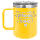 Laser etched yellow 15 oz vacuum insulated coffee mug with 'May your Coffee Be Strong' design
