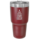 Laser etched maroon 30 oz vacuum insulated tumbler with 'Save Water Drink Beer' design