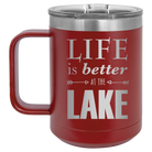 Laser etched maroon 15 oz vacuum insulated coffee mug with 'Life is Better at the Lake' design