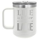 Laser etched white 15 oz vacuum insulated coffee mug with 'Life is Better at the Lake' design