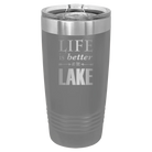 Laser etched dark gray 20 oz vacuum insulated tumbler with 'Life is Better at the Lake' design