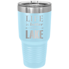 Laser etched light blue 30 oz vacuum insulated tumbler with 'Life is Better at the Lake' design