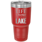 Laser etched red 30 oz vacuum insulated tumbler with 'Life is Better at the Lake' design