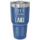 Laser etched royal blue 30 oz vacuum insulated tumbler with 'Life is Better at the Lake' design
