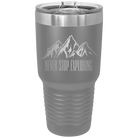 Laser etched dark gray 30 oz vacuum insulated tumbler with 'Never Stop Exploring2' design