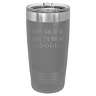 Laser etched dark gray 20 oz vacuum insulated tumbler with 'Coffee Dont Talk' design