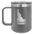 Laser etched dark gray 15 oz vacuum insulated coffee mug with 'Idaho Home' design