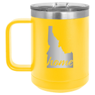 Laser etched yellow 15 oz vacuum insulated coffee mug with 'Idaho Home' design