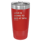 Laser etched red 20 oz vacuum insulated tumbler with 'Love is Going to Bed at 9pm' design