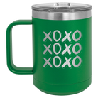 Laser etched green 15 oz vacuum insulated coffee mug with 'XOXO x3' design