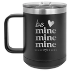 Laser etched black 15 oz vacuum insulated coffee mug with 'Be Mine Mine Mine' design