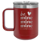 Laser etched maroon 15 oz vacuum insulated coffee mug with 'Be Mine Mine Mine' design
