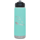 Laser etched teal 20 oz vacuum insulated water bottle with 'Our Love is Magic' design