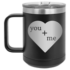 Laser etched black 15 oz vacuum insulated coffee mug with 'You Plus Me' design