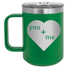 Laser etched green 15 oz vacuum insulated coffee mug with 'You Plus Me' design
