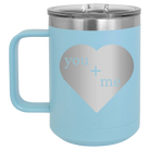 Laser etched light blue 15 oz vacuum insulated coffee mug with 'You Plus Me' design