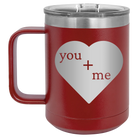 Laser etched maroon 15 oz vacuum insulated coffee mug with 'You Plus Me' design