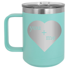Laser etched teal 15 oz vacuum insulated coffee mug with 'You Plus Me' design
