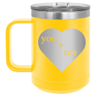 Laser etched yellow 15 oz vacuum insulated coffee mug with 'You Plus Me' design