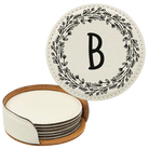 White round leatherette coasters set and holder with personalized 'Floral Circle' design