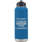 Laser etched royal blue 32 oz vacuum insulated water bottle with 'You Cant Scare Me' design