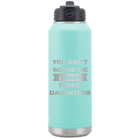Laser etched teal 32 oz vacuum insulated water bottle with 'You Cant Scare Me' design