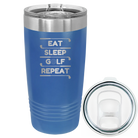 Laser etched royal blue 20 oz vacuum insulated tumbler with 'Eat Sleep Golf Repeat' design