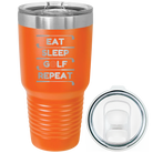Laser etched orange 30 oz vacuum insulated tumbler with 'Eat Sleep Golf Repeat' design