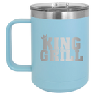 Personalized light blue 15 oz vacuum insulated coffee mug with etched 'King of the Grill' design