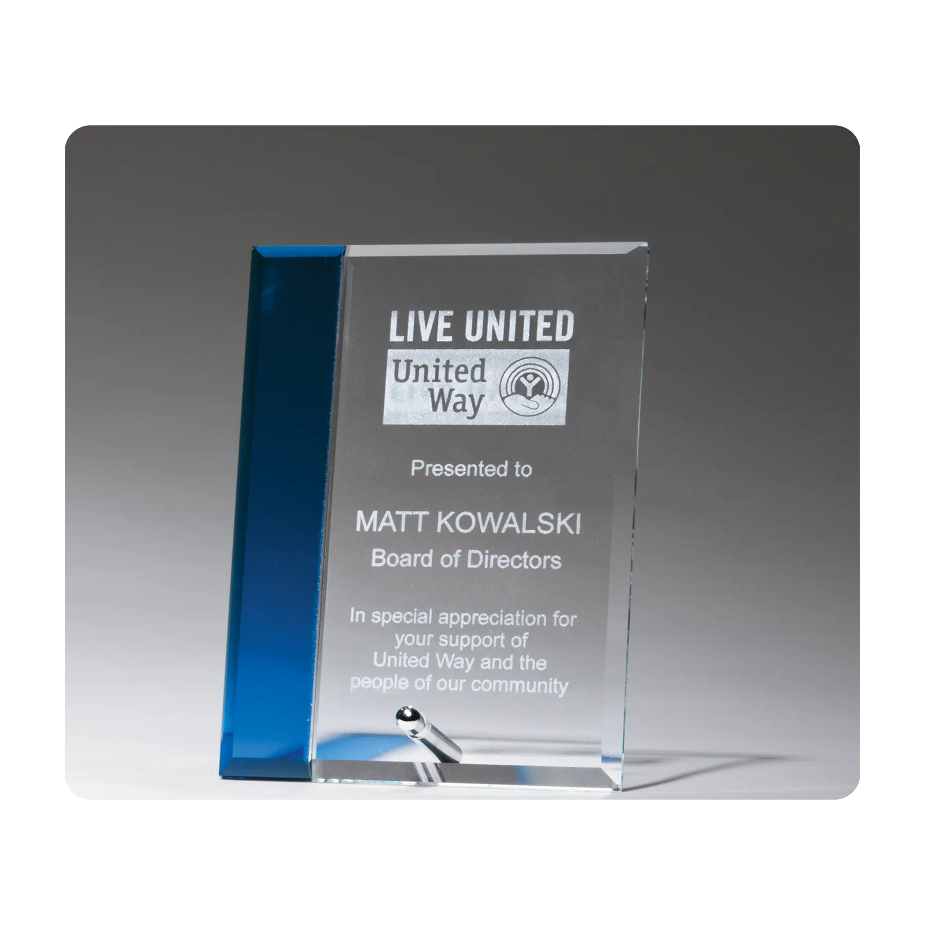 Clear glass easel award with blue highlights, personalized for your event, milestone or recognition