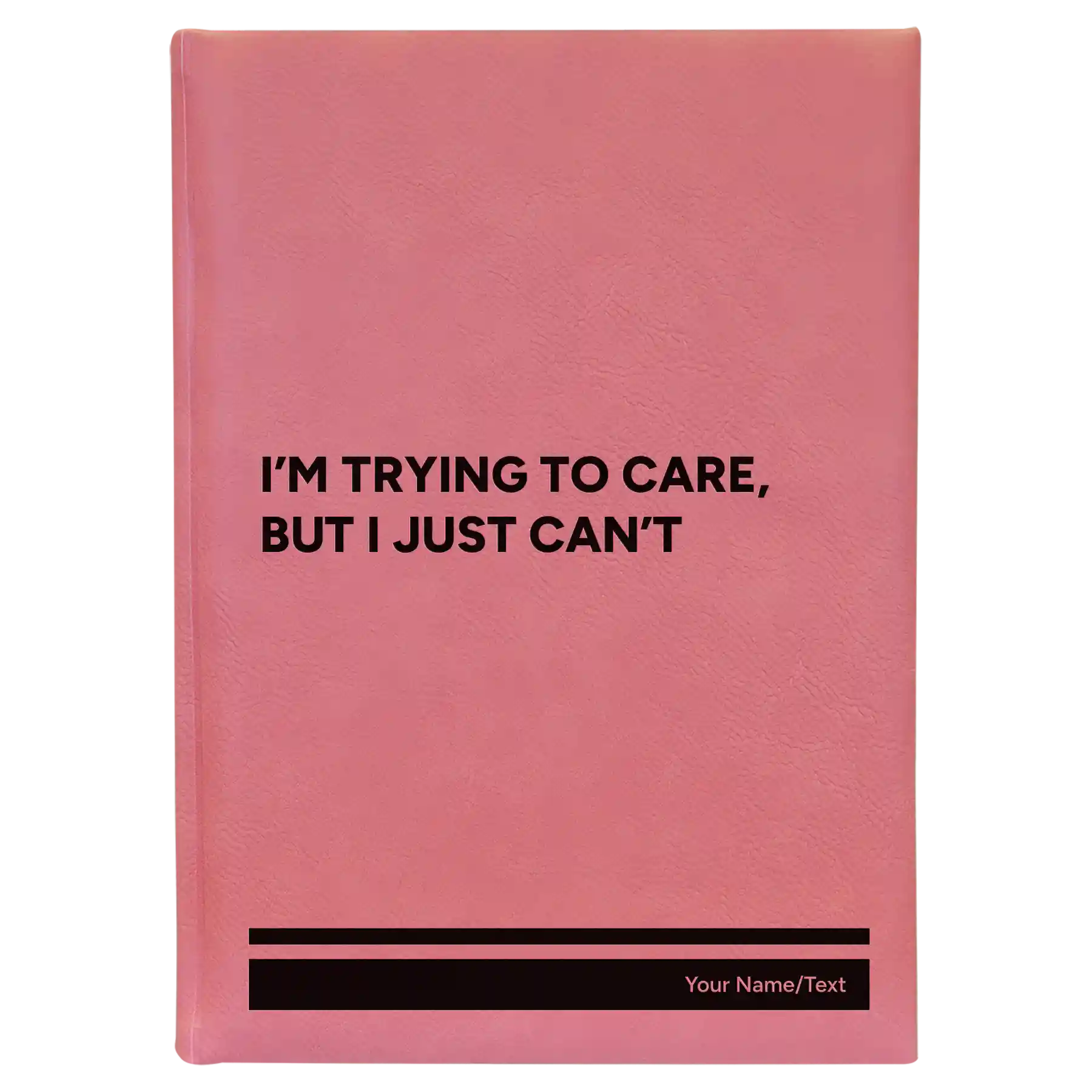 Large pink leatherette sketch book laser etched with 'Trying to Care' design