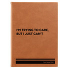 Large rawhide leatherette sketch book laser etched with 'Trying to Care' design