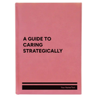 Large pink leatherette sketch book laser etched with 'A guide to caring strategically' design
