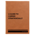 Large rawhide leatherette sketch book laser etched with 'A guide to caring strategically' design