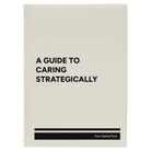 Large white leatherette journal laser etched with 'A guide to caring strategically' design