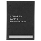 Large black/silver leatherette sketch book laser etched with 'A guide to caring strategically' design