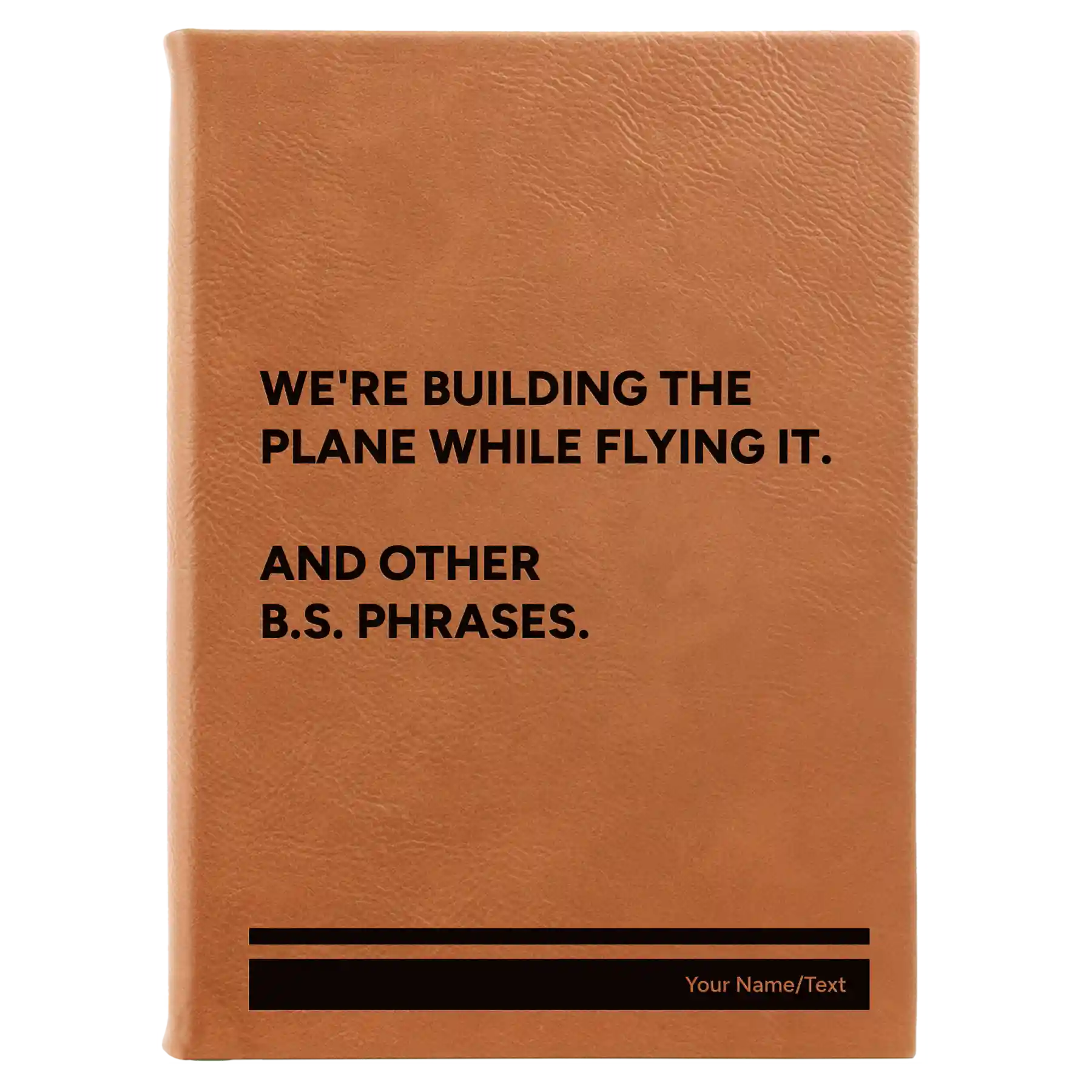 Large rawhide leatherette sketch book laser etched with 'We're Building The Plane While Flying It. And Other B.S. Phrases' design