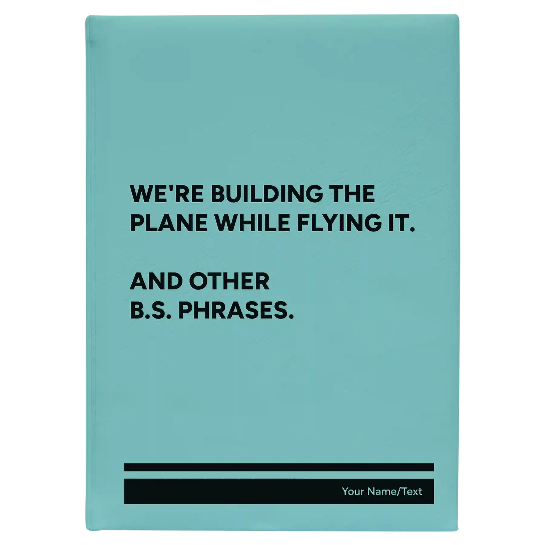 Large teal leatherette journal laser etched with 'We're Building The Plane While Flying It. And Other B.S. Phrases' design