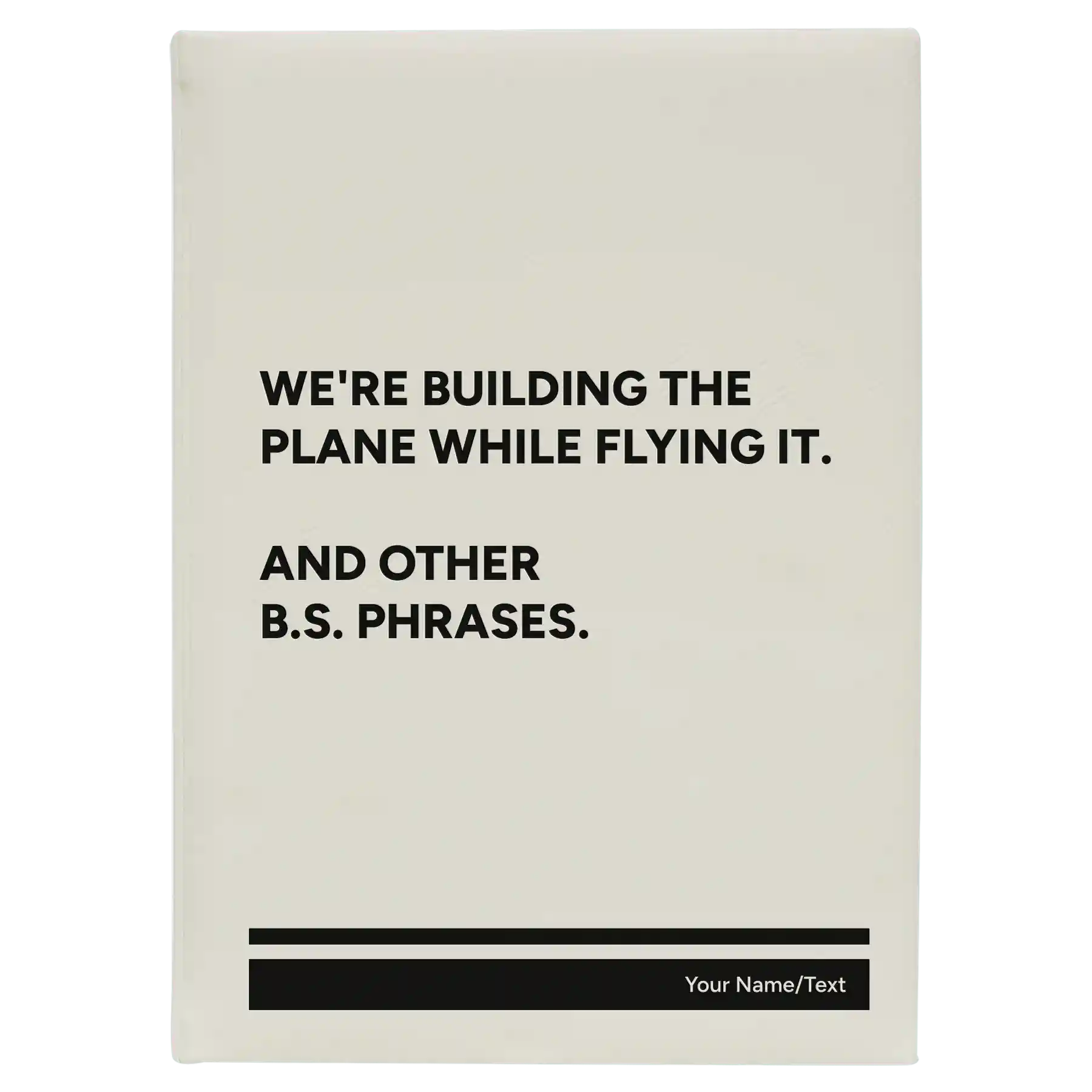 Large white leatherette journal laser etched with 'We're Building The Plane While Flying It. And Other B.S. Phrases' design