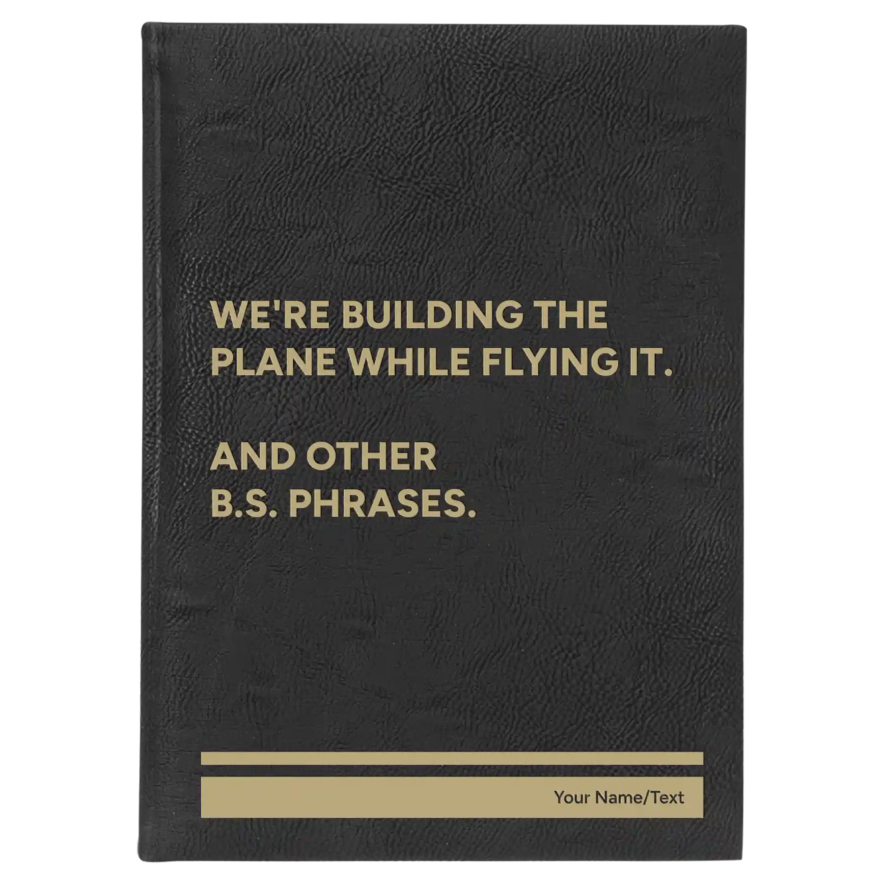Large black/gold leatherette journal laser etched with 'We're Building The Plane While Flying It. And Other B.S. Phrases' design