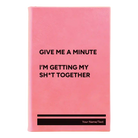 Small pink leatherette sketch book laser etched with 'Give Me A Minute' design