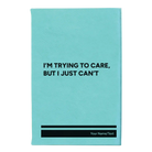 Small teal leatherette journal laser etched with 'Trying to Care' design