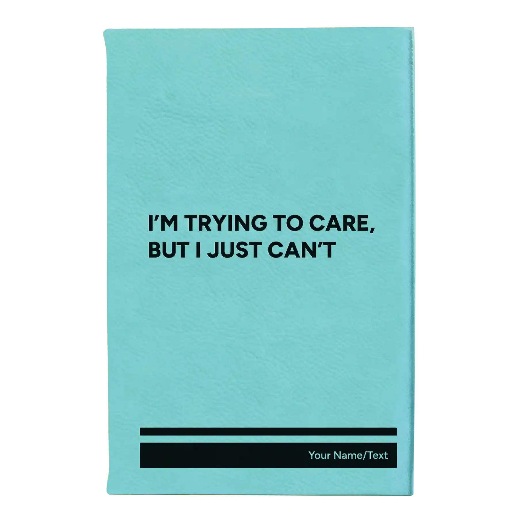 Small teal leatherette journal laser etched with 'Trying to Care' design