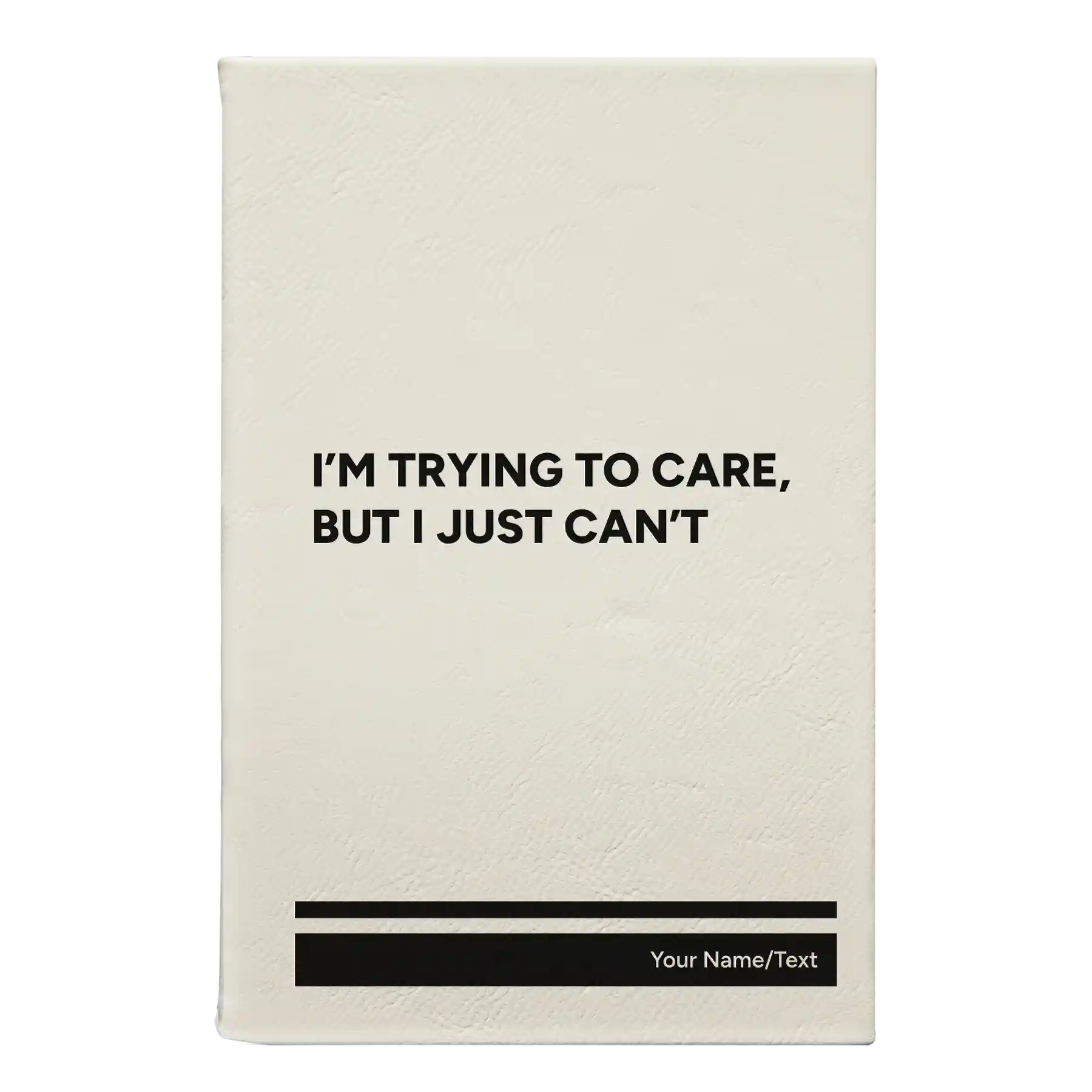 Small white leatherette journal laser etched with 'Trying to Care' design