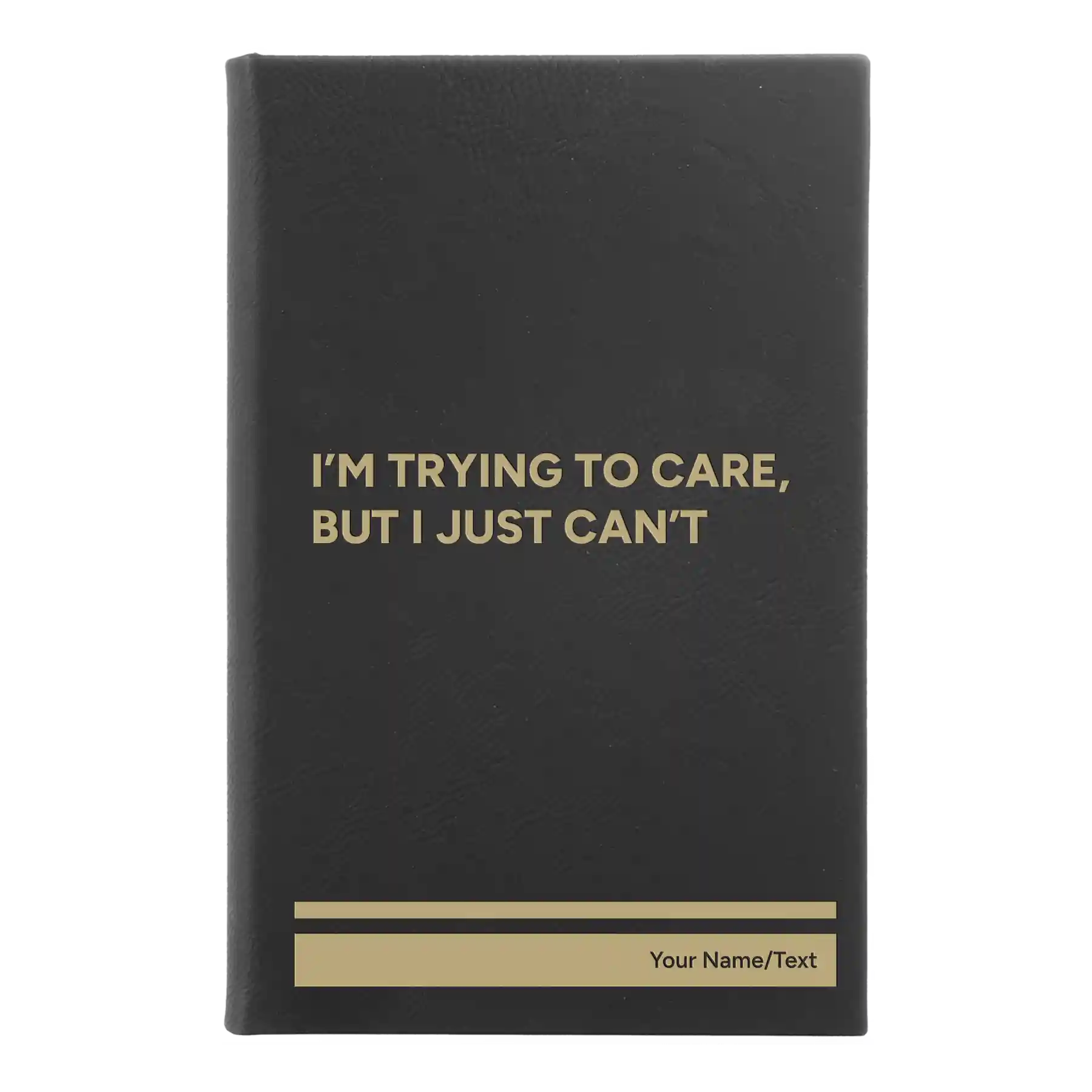 Small black/gold leatherette journal laser etched with 'Trying to Care' design