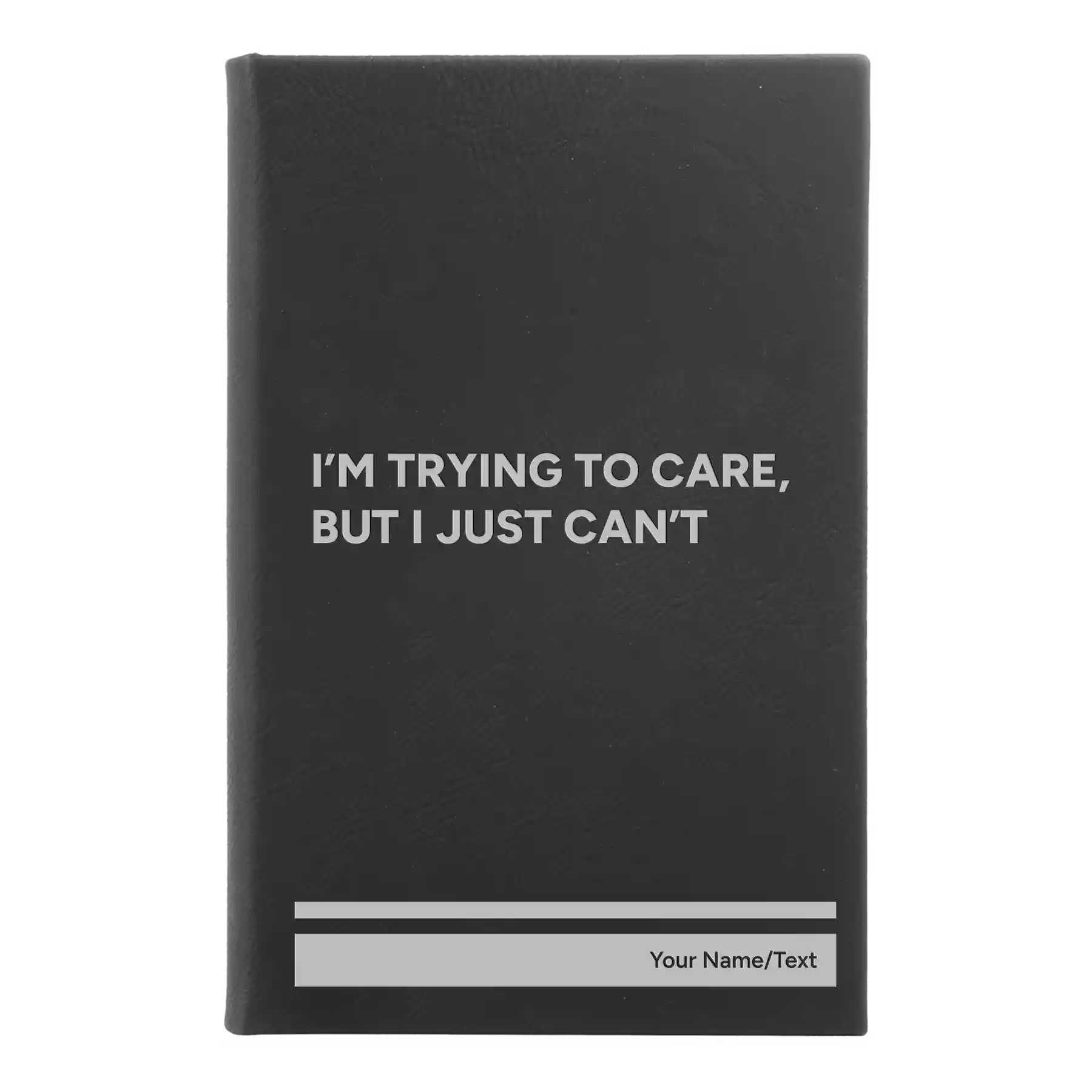 Small black/silver leatherette sketch book laser etched with 'Trying to Care' design