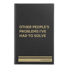 Small black/gold leatherette journal laser etched with 'Other Peoples Problems' design