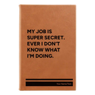 Small rawhide leatherette sketch book laser etched with 'My Job is Super Secret' design